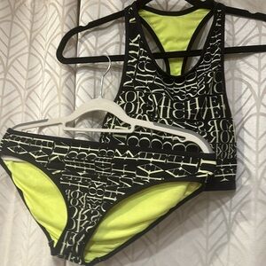 Michael Kors bathing suit, 2pc size large  . Green white black wore it once ..